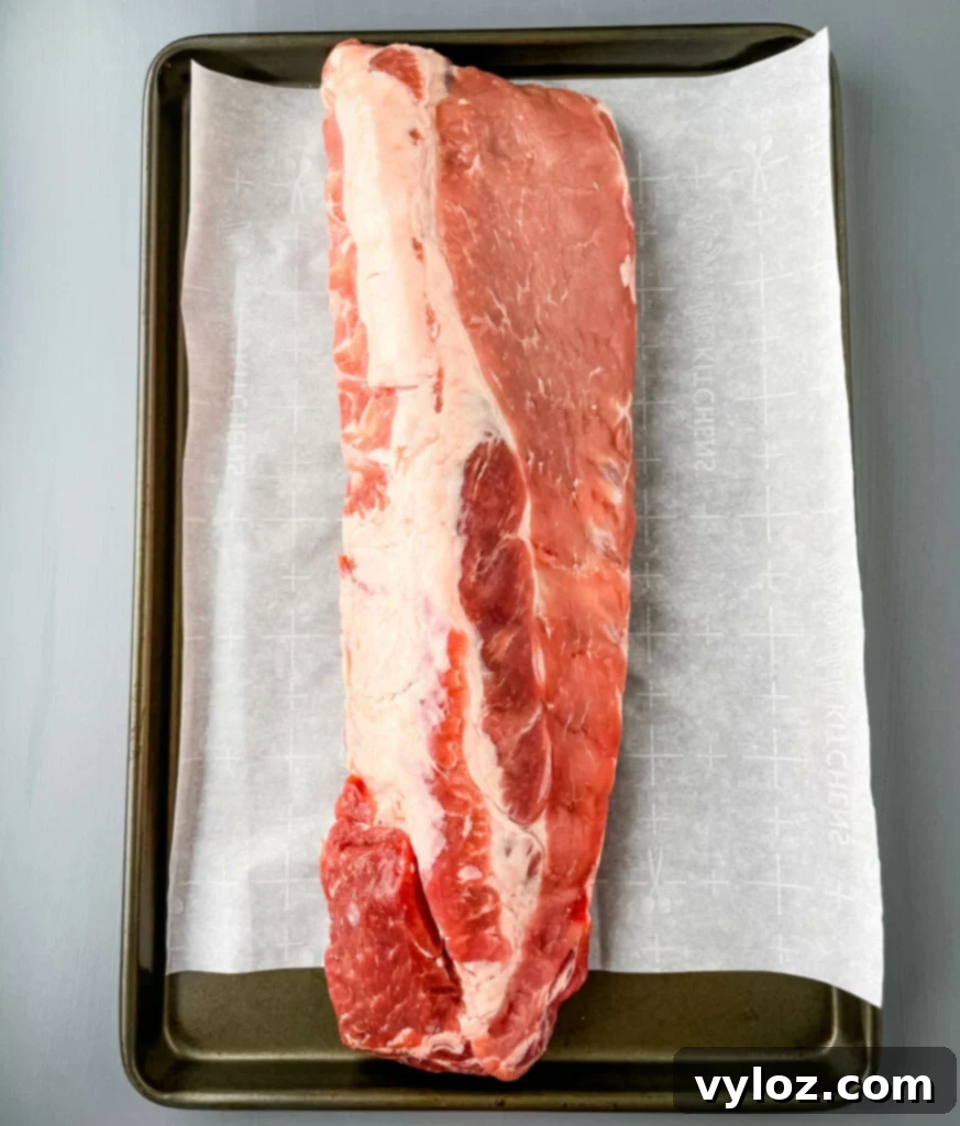 Raw baby back ribs ready for seasoning