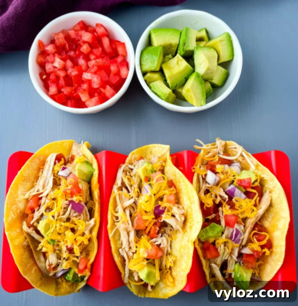 Instant Pot shredded chicken tacos on a plate