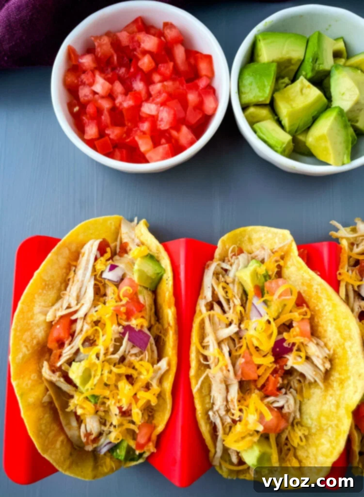 Instant Pot shredded chicken tacos on a plate
