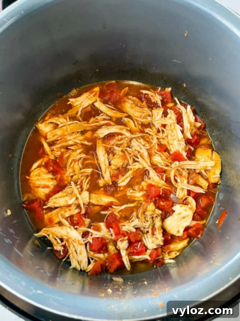 shredded taco chicken in an Instant Pot