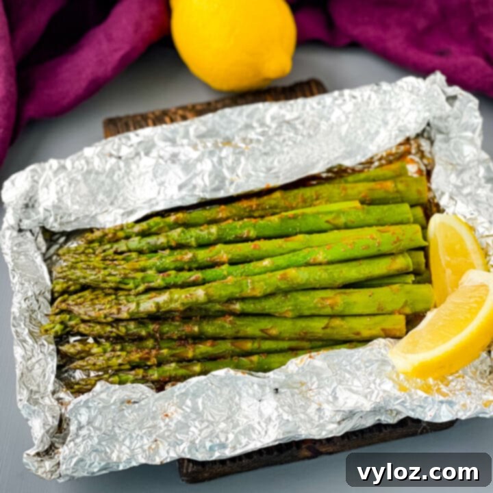 Tender and vibrant Easy Grilled Asparagus, seasoned with BBQ rub and perfectly cooked within a foil packet.