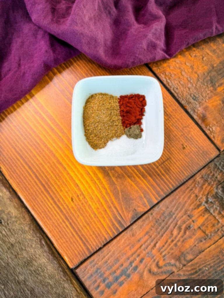 Succulent Roasted Turkey Wings 3 Creole seasoning, smoked paprika, salt, and pepper in a white bowl