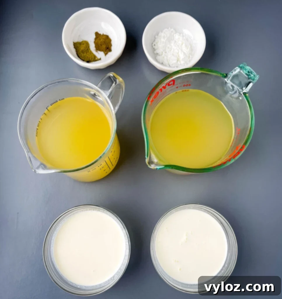 Individual glass bowls displaying key soup ingredients: chicken broth, milk, heavy cream, cornstarch, dried thyme, and dried oregano.