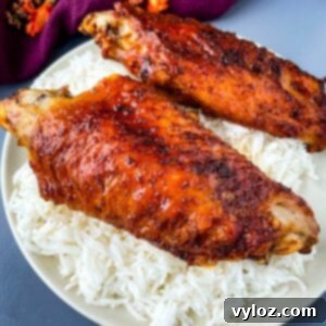 air fryer turkey wings and rice on a plate