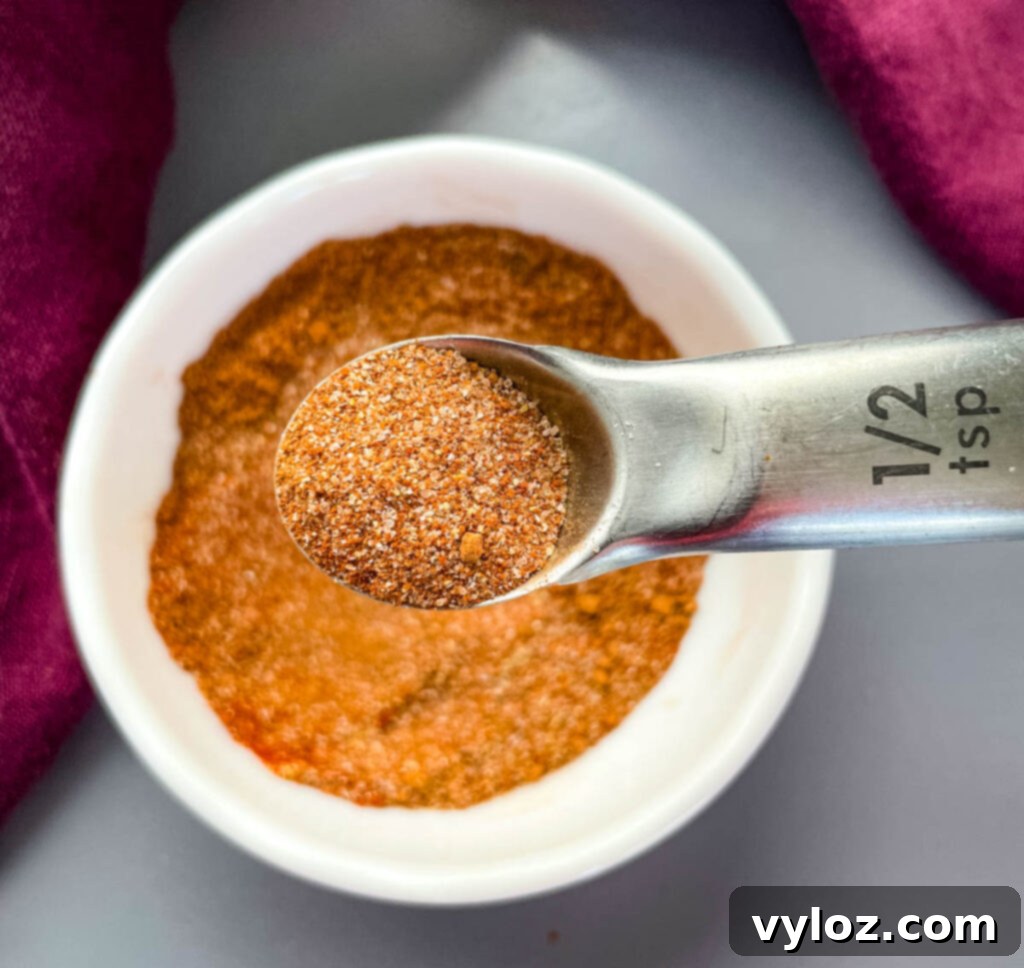 The Ultimate Steak Dry Rub 4 homemade steak seasoning and rub in a white bowl