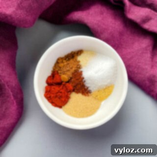 The Ultimate Steak Dry Rub 5 homemade steak seasoning and rub in a white bowl