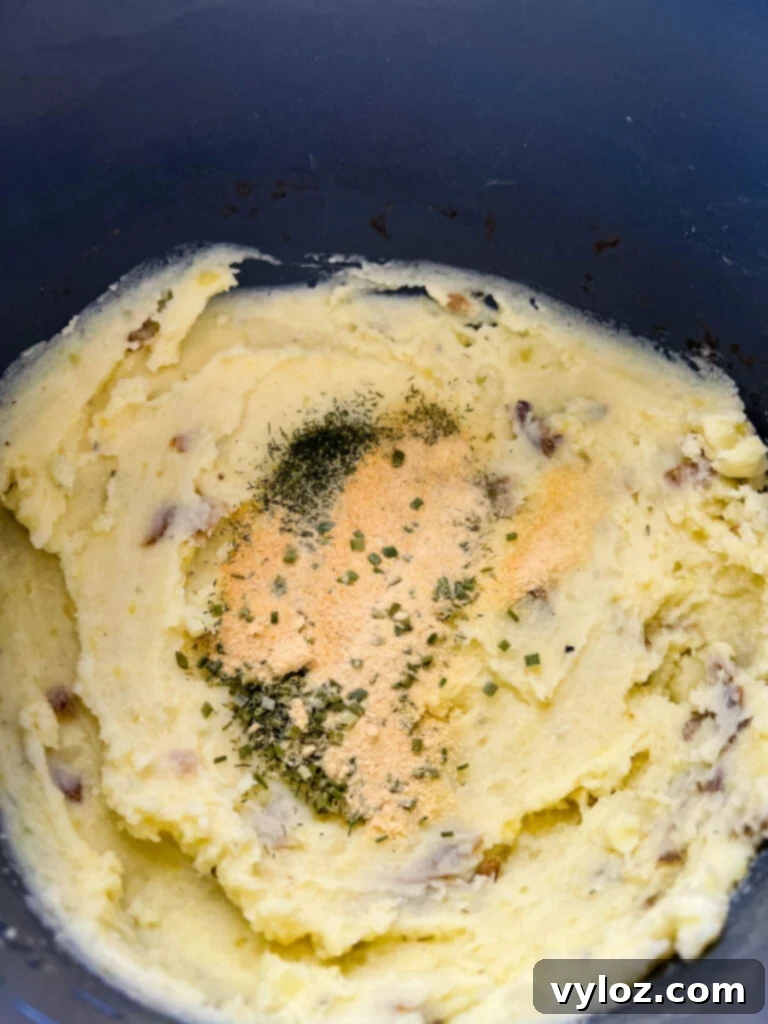 Ranch Mashed Potatoes 6 ranch mashed potatoes in a pot with spices and seasoning