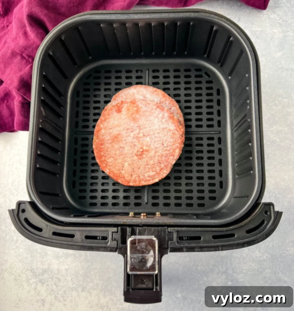 Crispy Air Fryer Frozen Burgers: From Freezer to Plate 4 frozen burgers in an air fryer