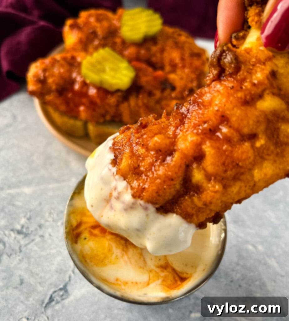 Blazin' Nashville Tenders 12 Nashville hot chicken tender dipped in sauce