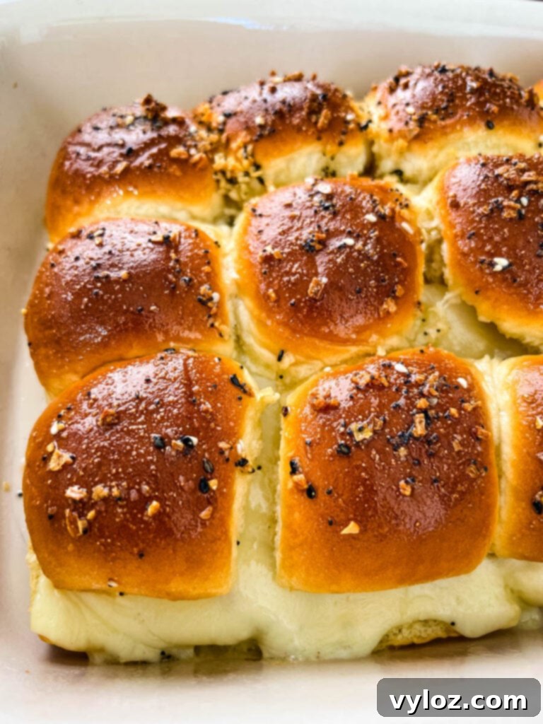 Cheesy Turkey Sliders 9 A serving of turkey cheese sliders arranged in a baking dish, ready to be enjoyed