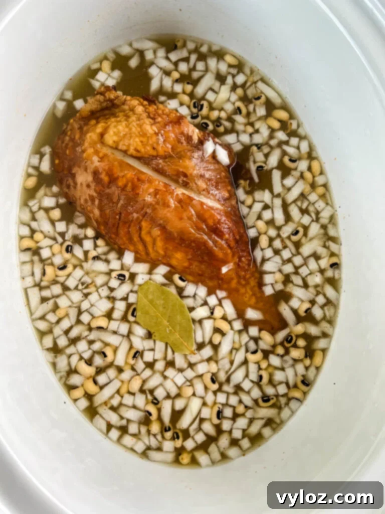 No-Soak Slow Cooker Smoked Turkey Black Eyed Peas 6 dried black eyed peas, onions, bay leaf, spices, and smoked turkey, and broth in slow cooker Crockpot