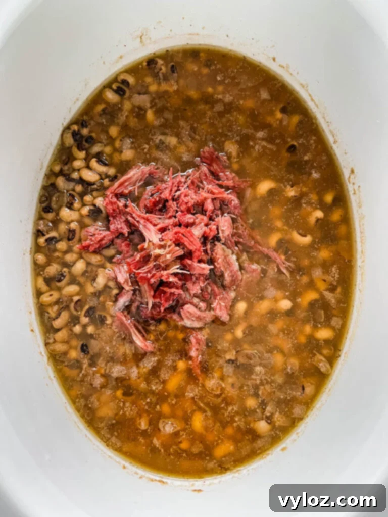 No-Soak Slow Cooker Smoked Turkey Black Eyed Peas 8 cooked black eyed peas with smoked turkey in slow cooker Crockpot