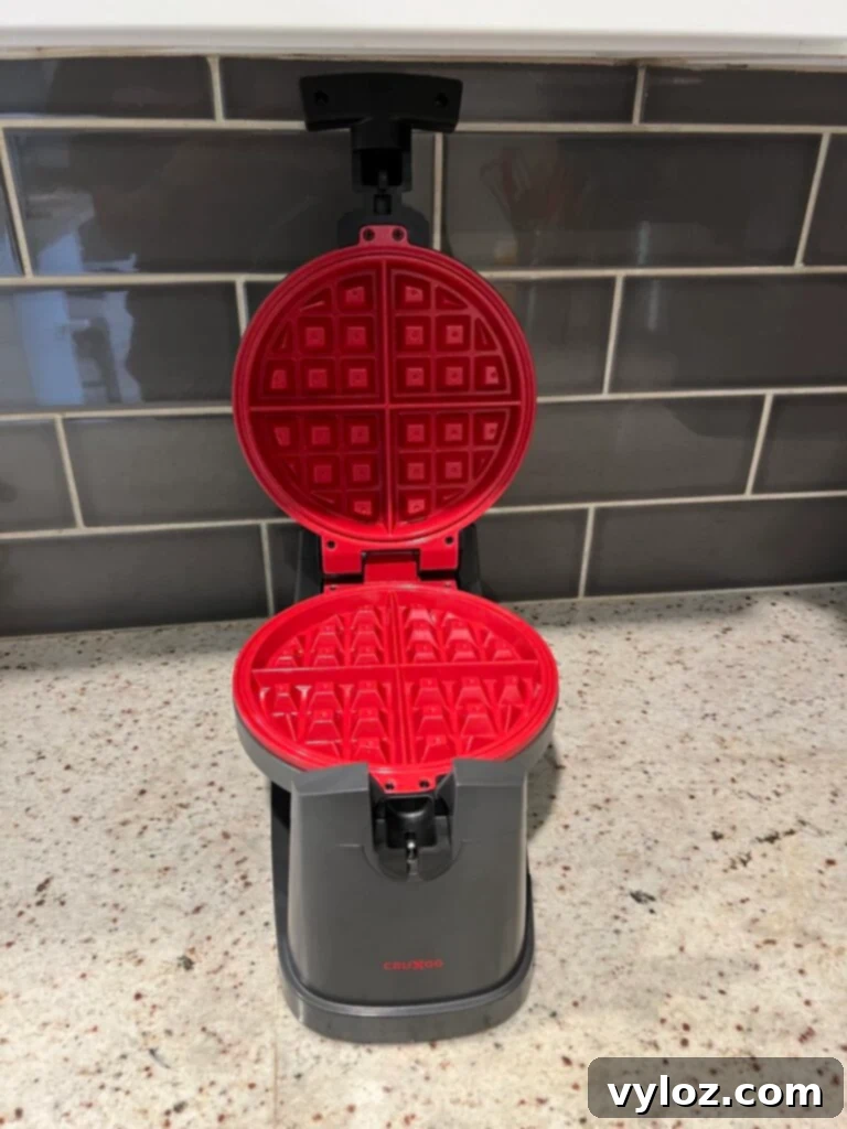 Close-up of a white stoneware flower party serving set with delicate floral details, perfect for holiday appetizers or desserts.