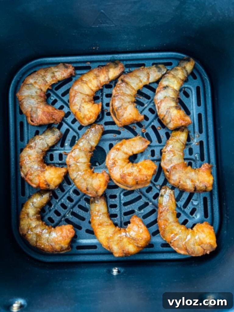Effortless Caribbean Shrimp 10 raw jerk shrimp in air fryer basket
