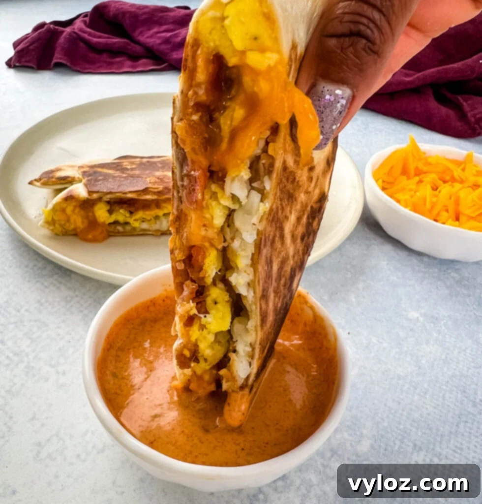 Taco Bell Zesty Jalapeno Cream 5 Breakfast crunchwrap dipped in creamy Taco Bell sauce