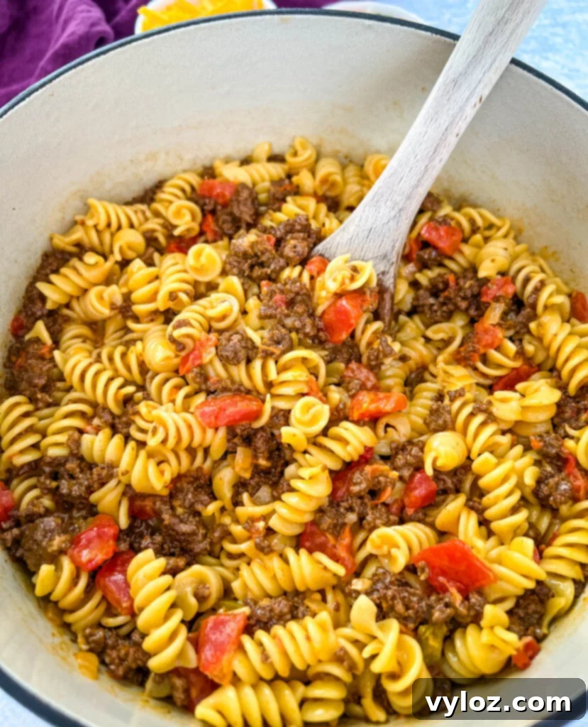 cheesy taco pasta in a large pot