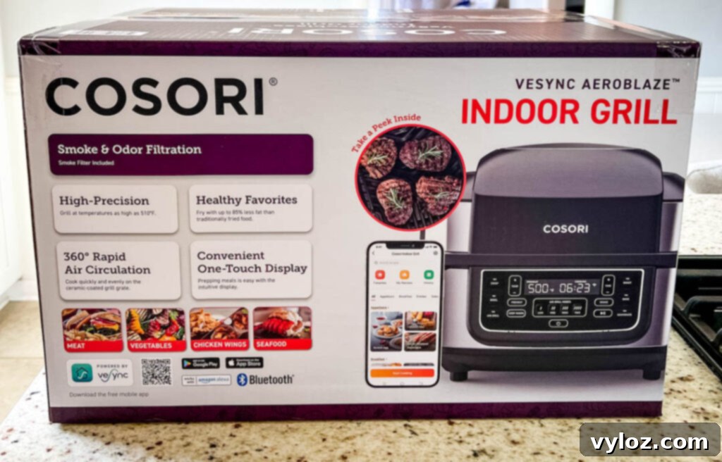 Cosori Aeroblaze Indoor Grill still in its packaging on a kitchen counter, highlighting the organized unboxing experience.