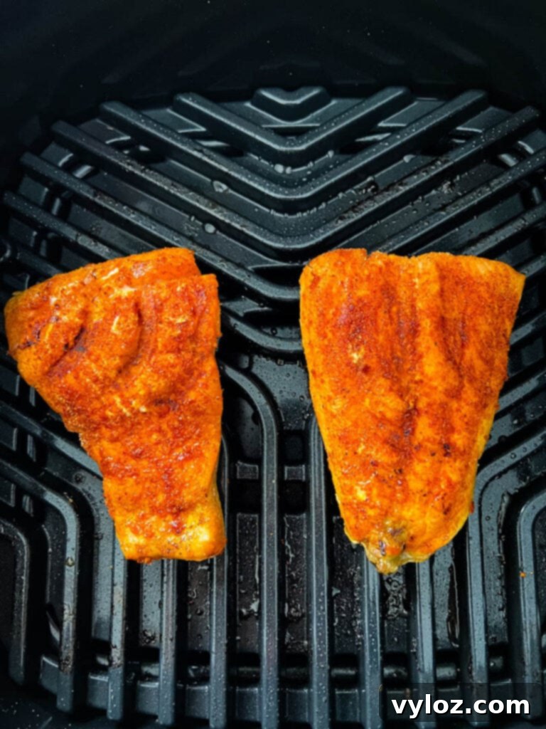 Ninja Foodi Grilled Salmon 6 Cooked salmon on a Ninja Foodi or Cosori indoor grill, showing grill marks.