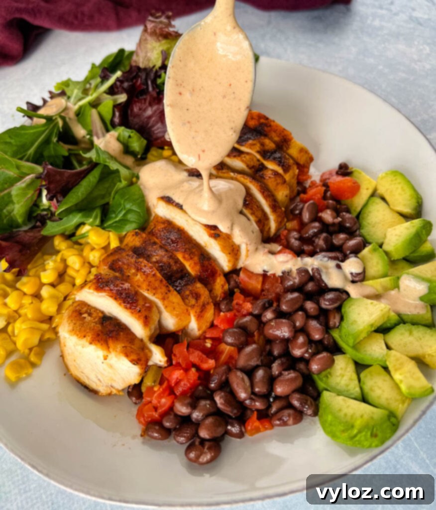 Smoky Southwest Salad with Chipotle Ranch 2 Delicious Southwest Salad with chicken, mixed greens, corn, black beans, avocado, and a generous drizzle of chipotle ranch dressing.