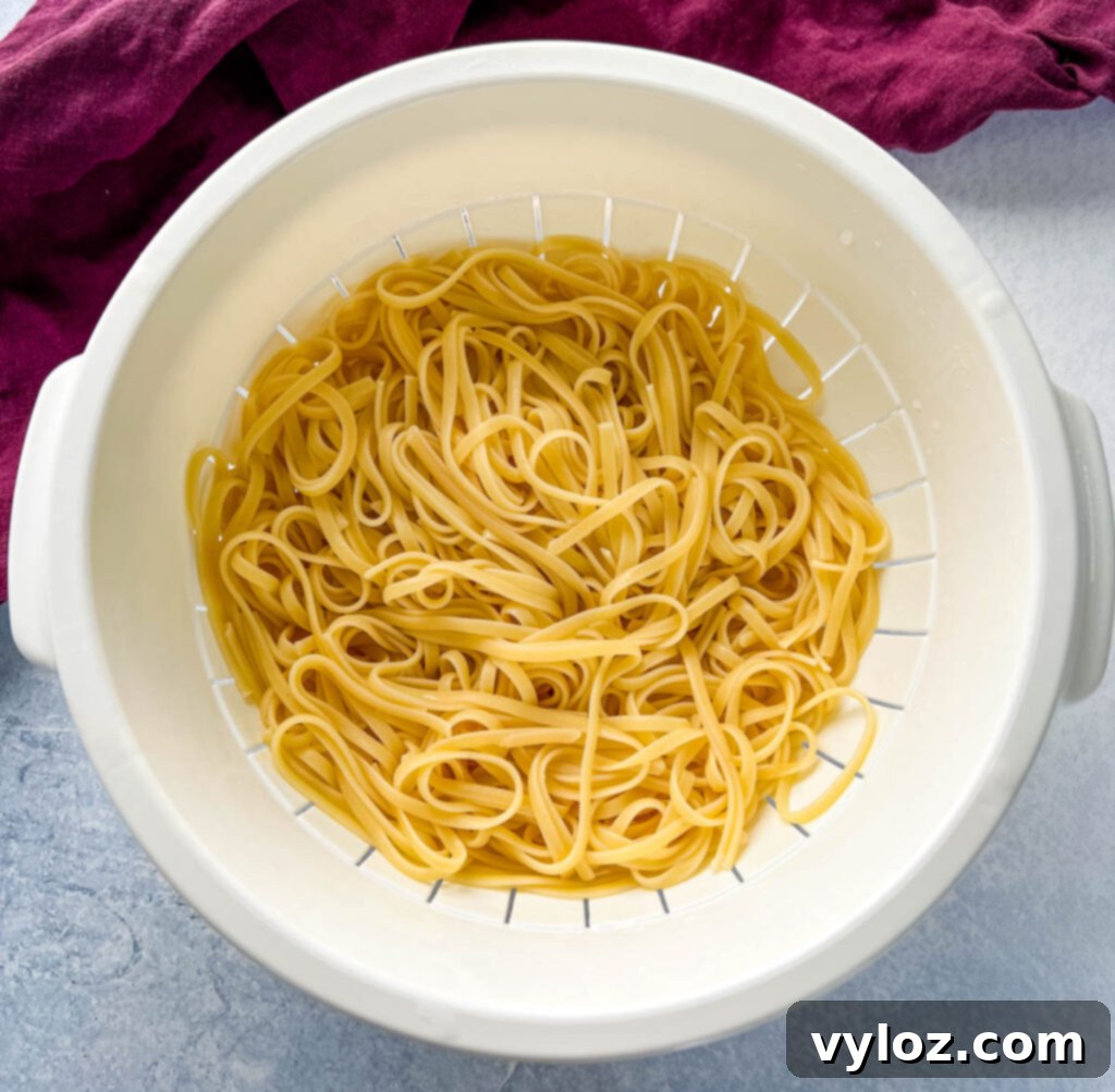 cooked pasta in a colander