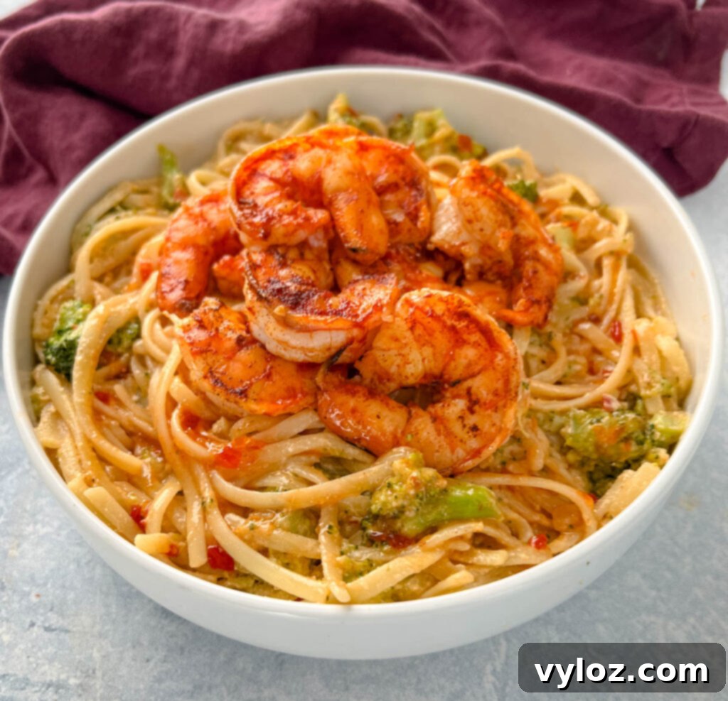 bang bang shrimp pasta in a white bowl
