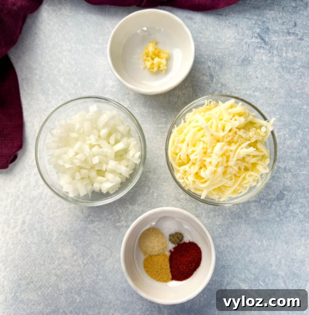 garlic, onions, mozzarella cheese, and spices in separate bowls