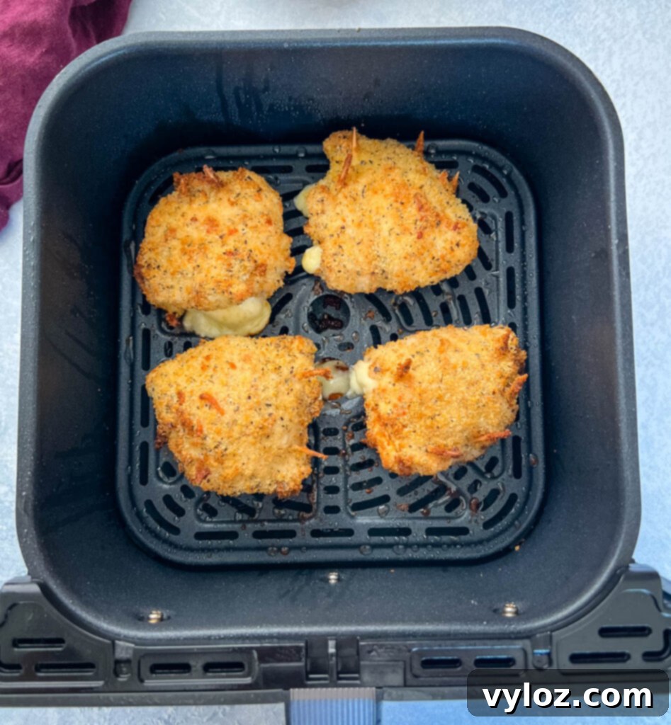 breaded stuffed mozzarella chicken breast in an air fryer