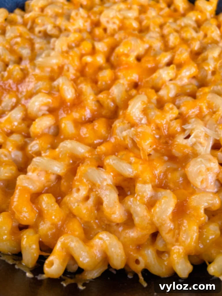 smoked mac and cheese in a cast iron skillet