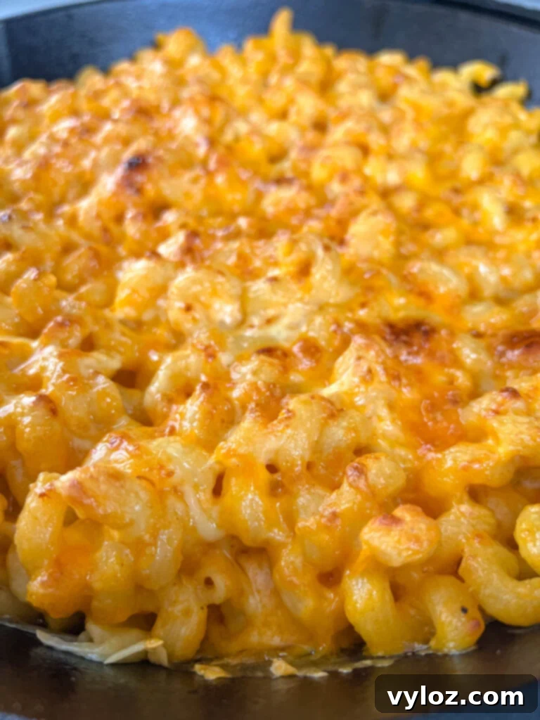 smoked mac and cheese in a cast iron skillet