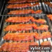 Ultimate Traeger Smoked Bacon 9 cooked bacon on a Traeger smoker