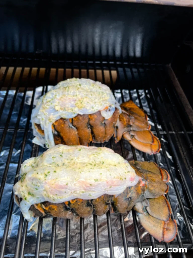 Effortless Smoked Lobster Tails 9 Perfectly smoked lobster tails cooking on the grates of a smoker, with a visible smoky ambiance.