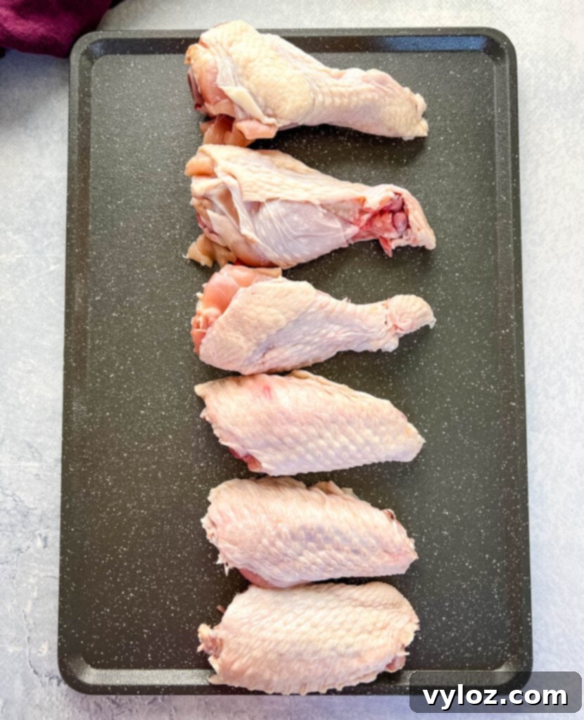close-up of raw turkey wings, showcasing their texture