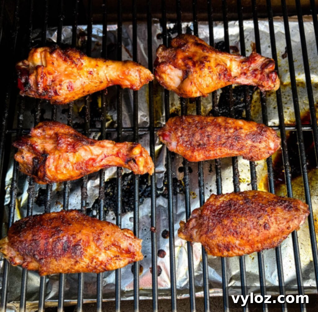 smoked turkey wings cooking on a Traeger pellet grill