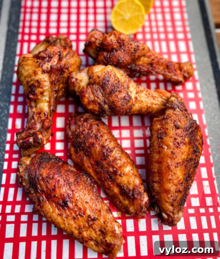 finished smoked turkey wings presented on a plate