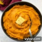 The 20 Easiest & Most Delicious Sides for Steak Night 2 mashed sweet potatoes in a bowl with butter and brown sugar