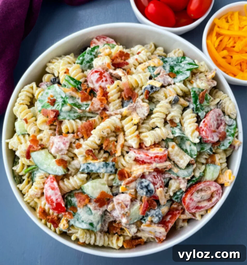 Creamy bacon ranch pasta salad in a white bowl, ready to be served