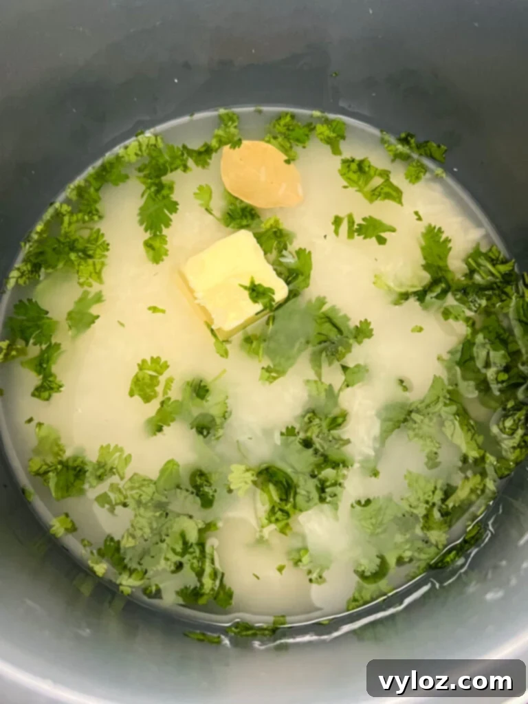 uncooked Chipotle cilantro lime rice in a pressure cooker