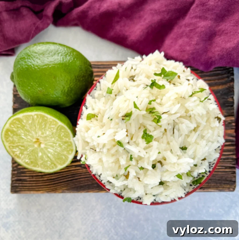 Chipotle cilantro lime rice in a bowl with fresh limes