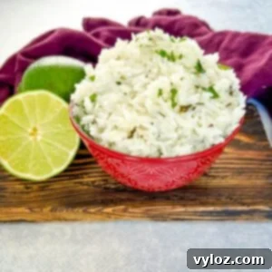 Chipotle cilantro lime rice in a bowl with fresh limes