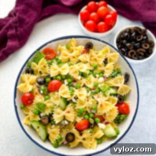 Zesty Bow Tie Pasta Salad 14 bow tie farfalle pasta salad with vegetables with Italian dressing in a bowl
