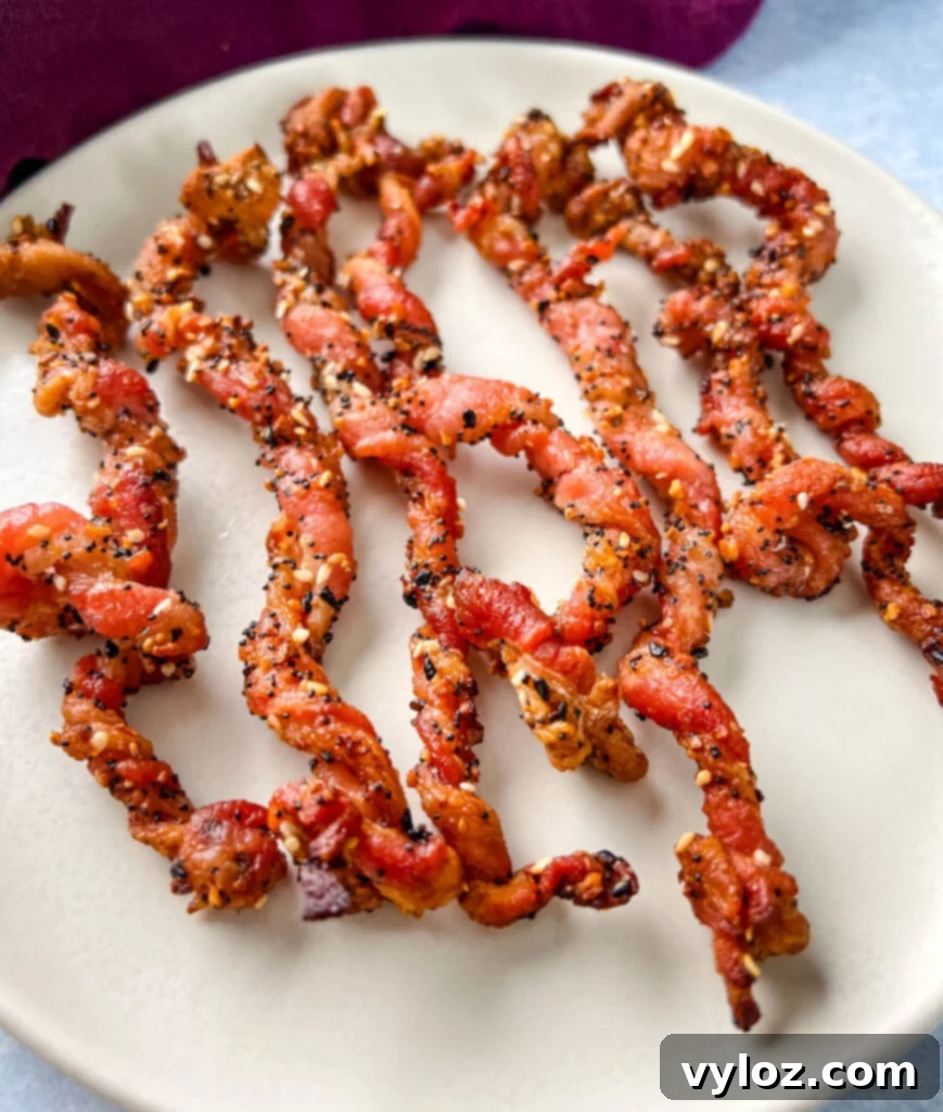 cooked twisted bacon on a plate