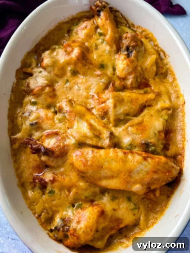 Savory Smothered Chicken Wings 2 smothered chicken wings in a baking dish