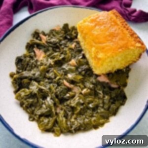 Southern turnip greens in a bowl with a slice of cornbread