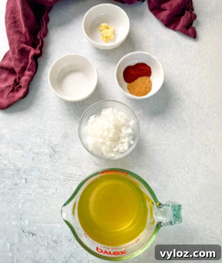 garlic, chopped onions, spices, sugar, and broth in separate bowls