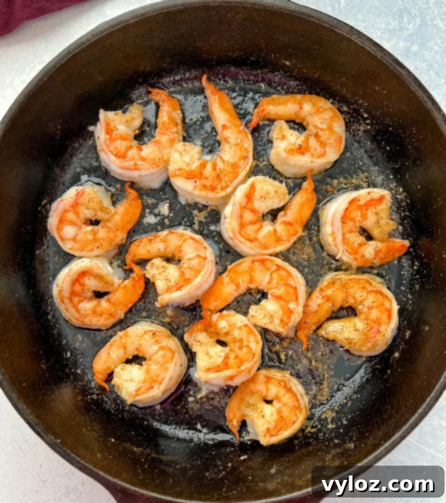 cooked shrimp in a cast iron skillet