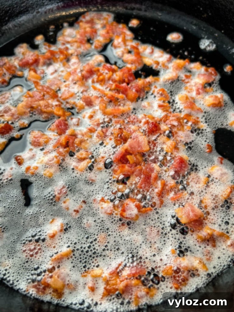 cooked bacon in a cast iron skillet