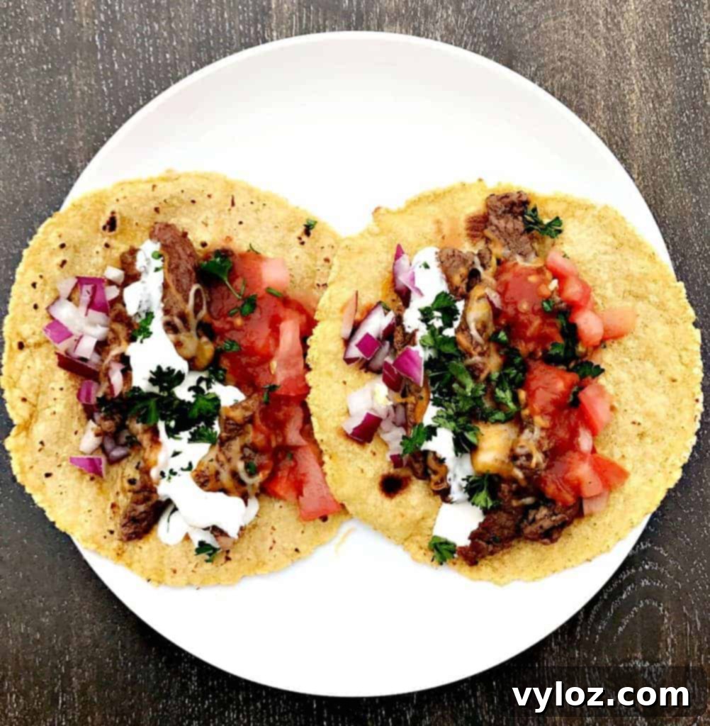 10-Minute Instant Pot Carne Asada Tacos 6 Plated Instant Pot 10-Minute Steak Tacos (Carne Asada) ready to be enjoyed