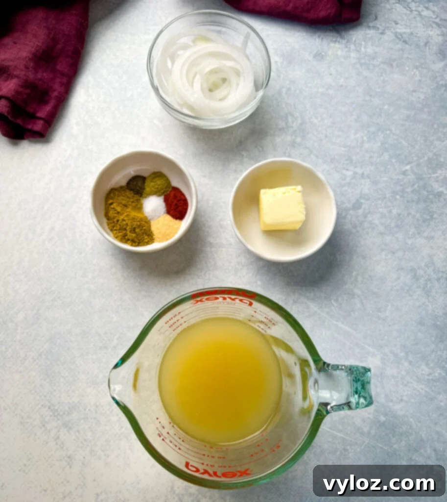 A vibrant display of fresh sliced onions, a rich blend of turkey rub spices, creamy butter, and savory broth, all neatly arranged in separate bowls, ready for the slow cooker