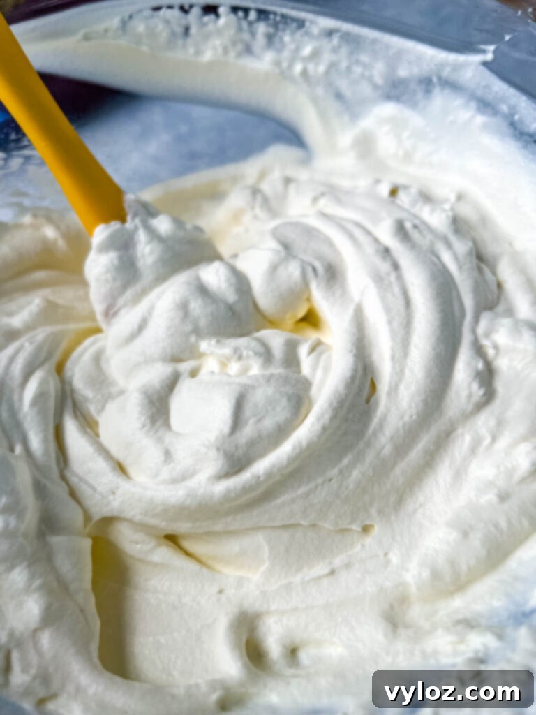 Zero Sugar Whipped Cream 2 Homemade sugar free whipped cream in a glass bowl, ready to serve