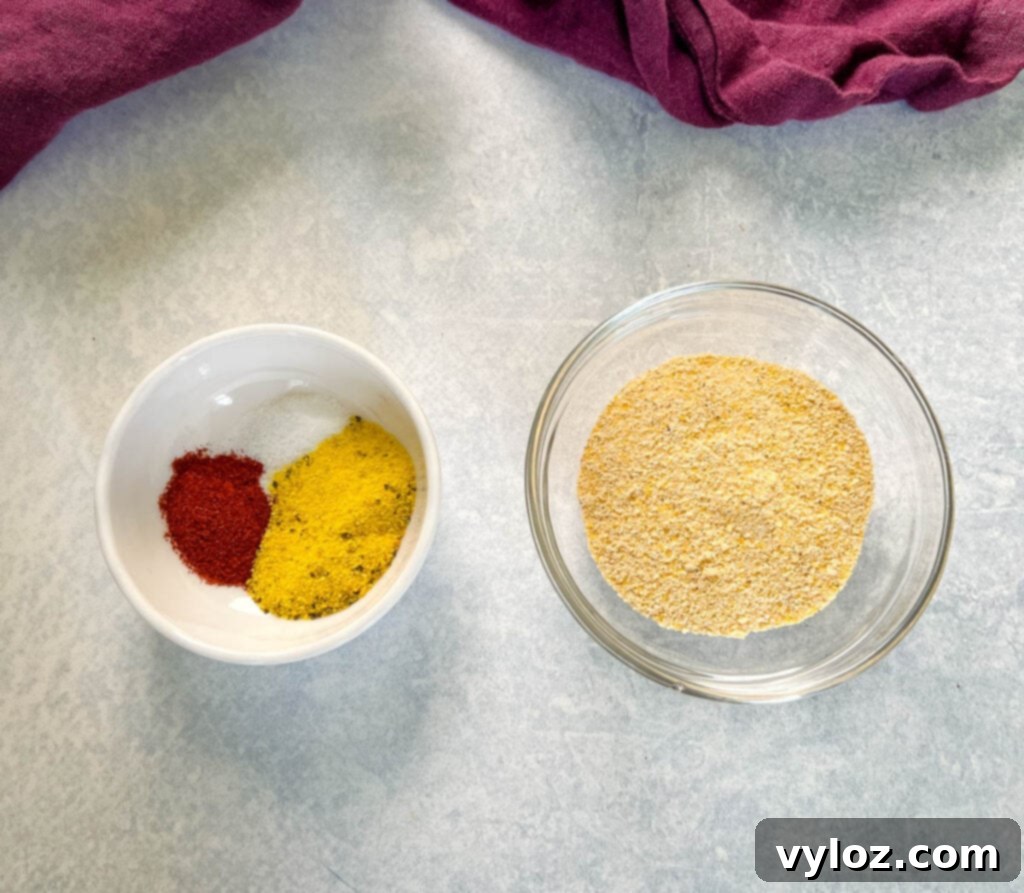 fish fry breading, smoked paprika, lemon pepper, and salt in white bowls